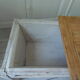 Coffee table made from an authentic farmhouse table, leg patinated pearl gray