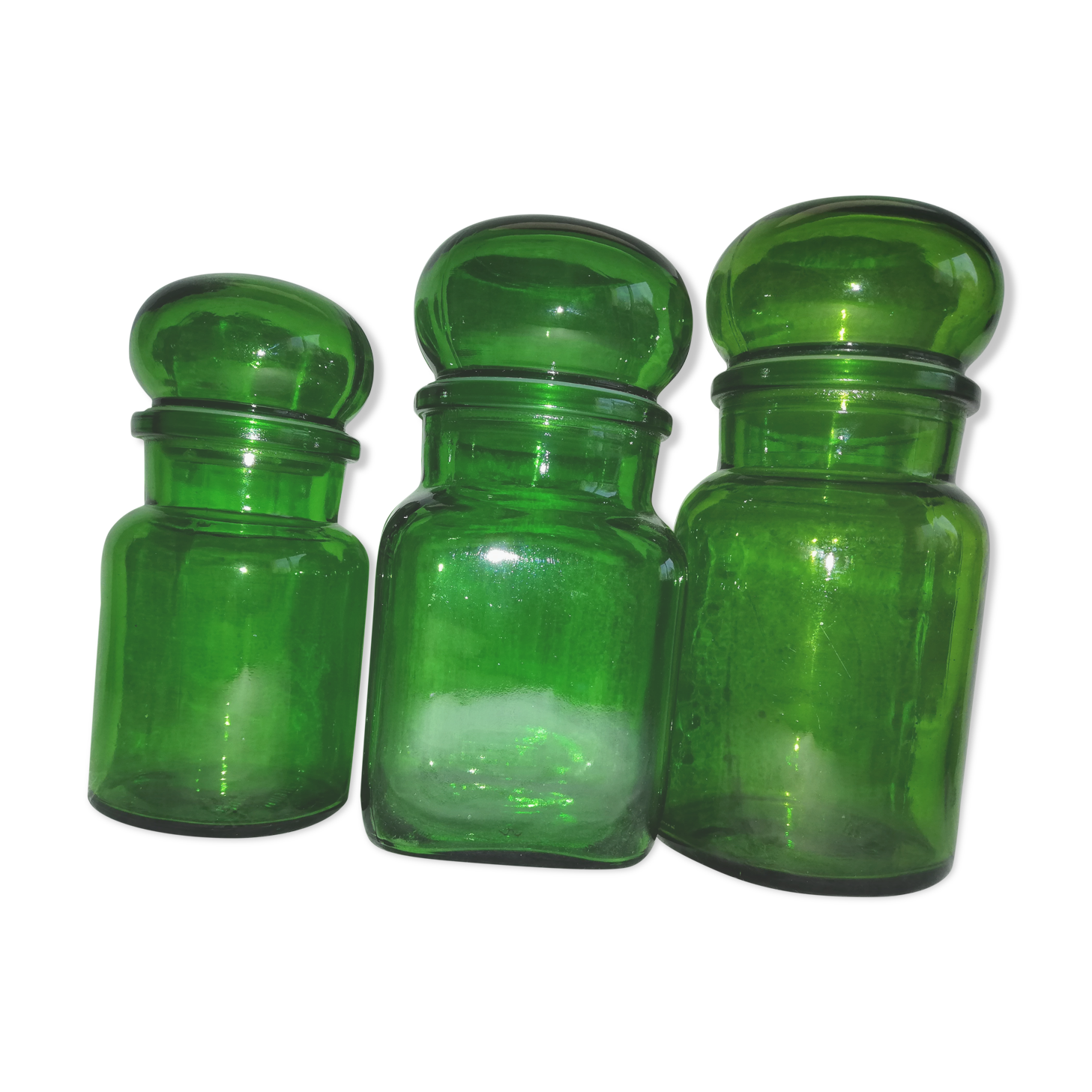 Trio of green jars