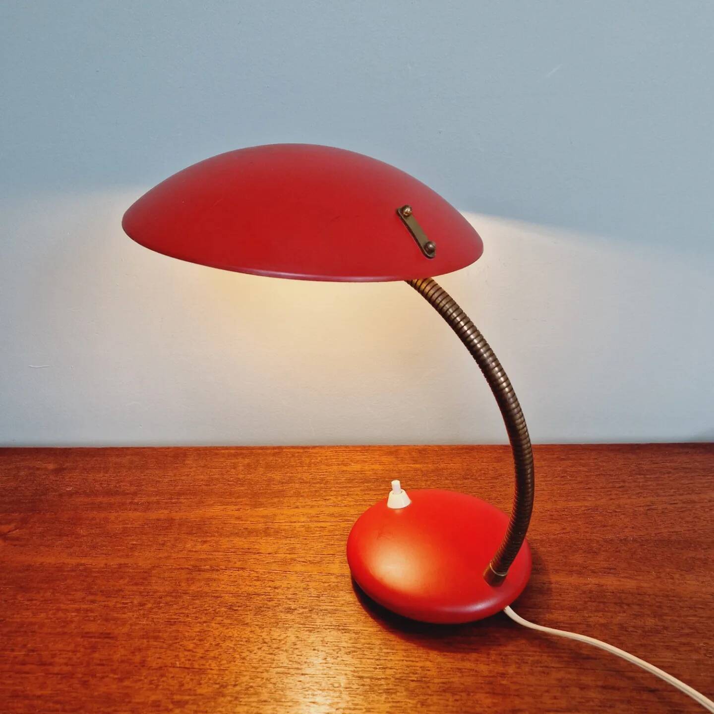 Articulated lamp in red lacquered metal, 1960s