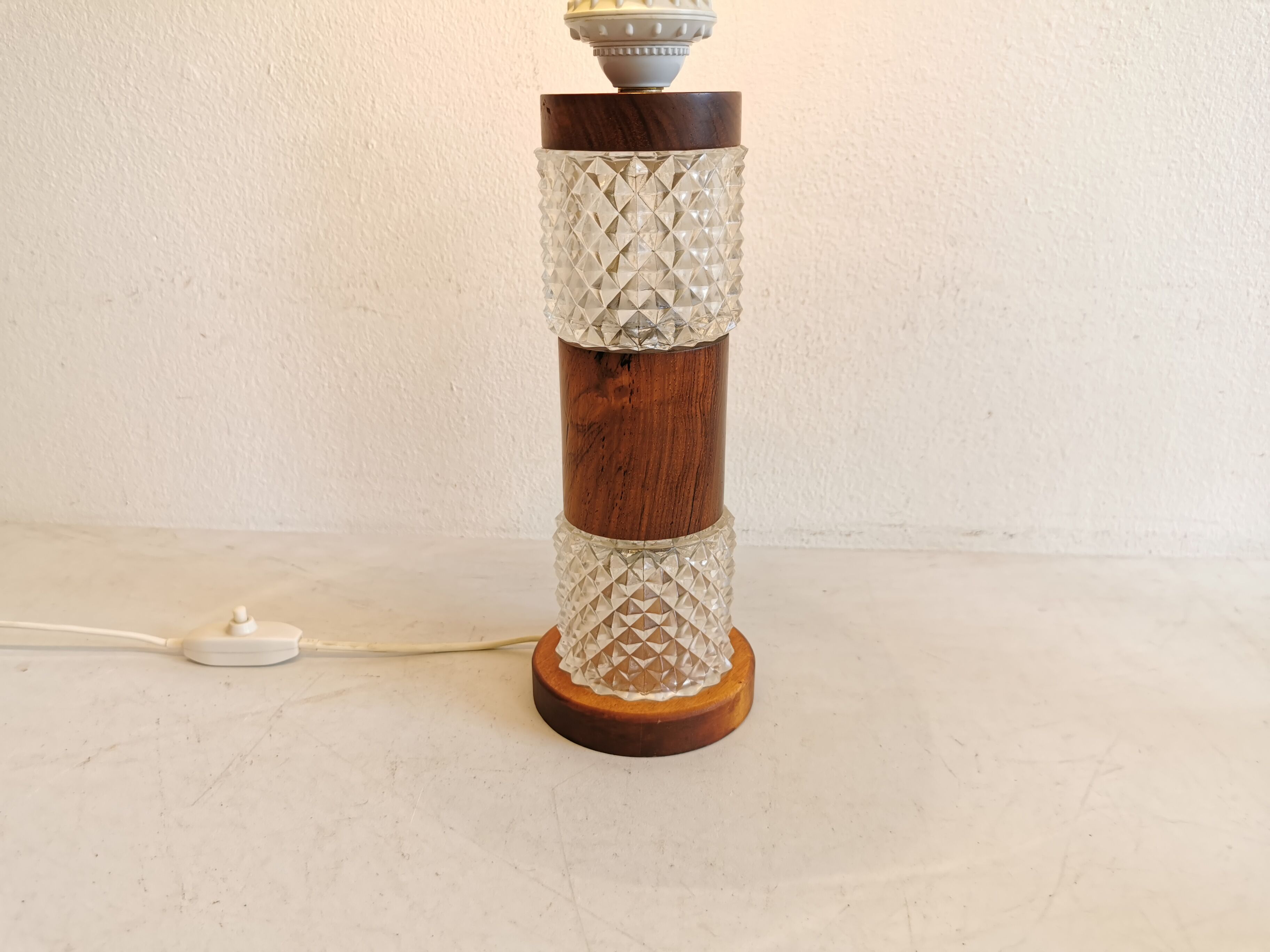 Swedish table lamp, made of what looks like rosewood and crystal glass.