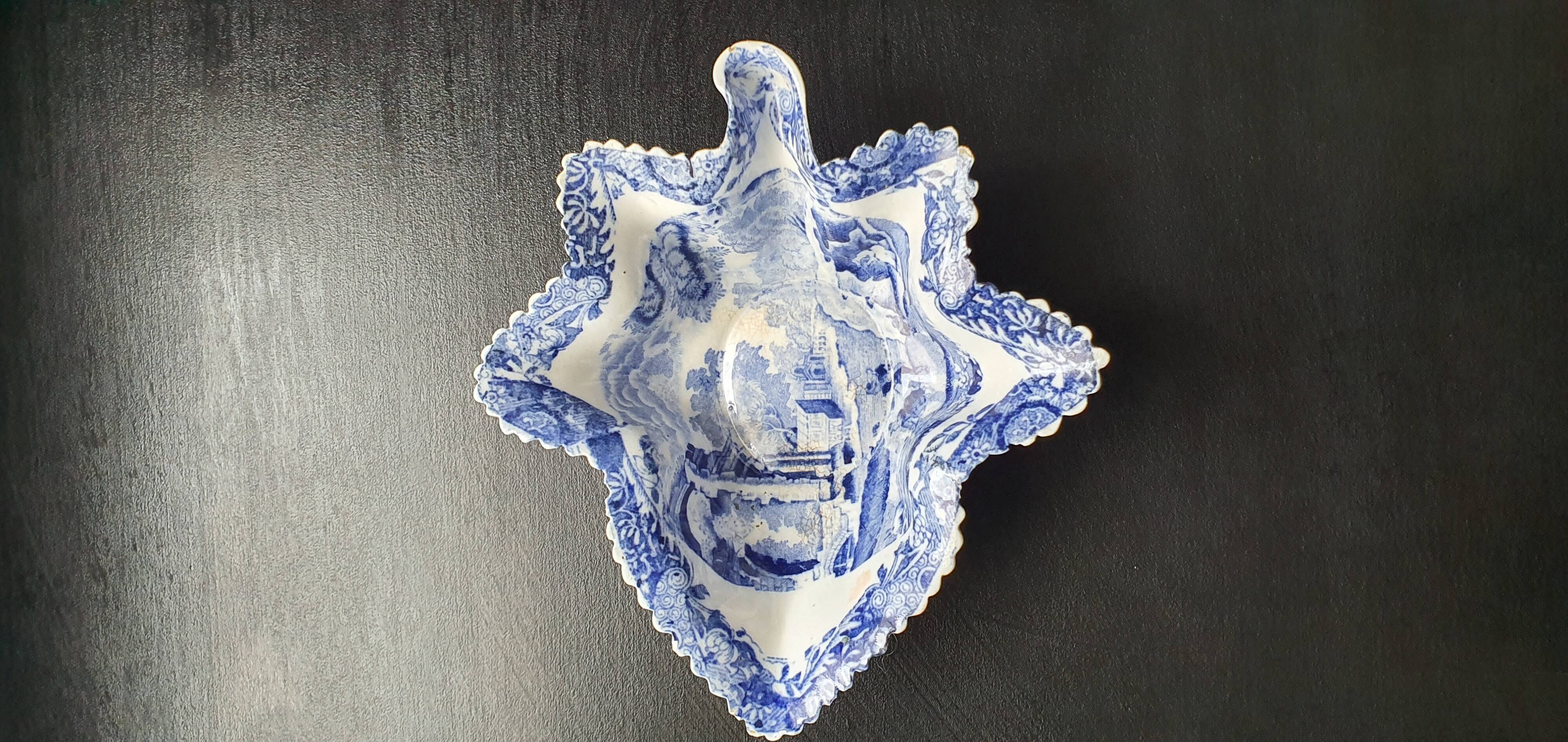 Copeland pickle dish in the shape of a leaf in blue earthenware.