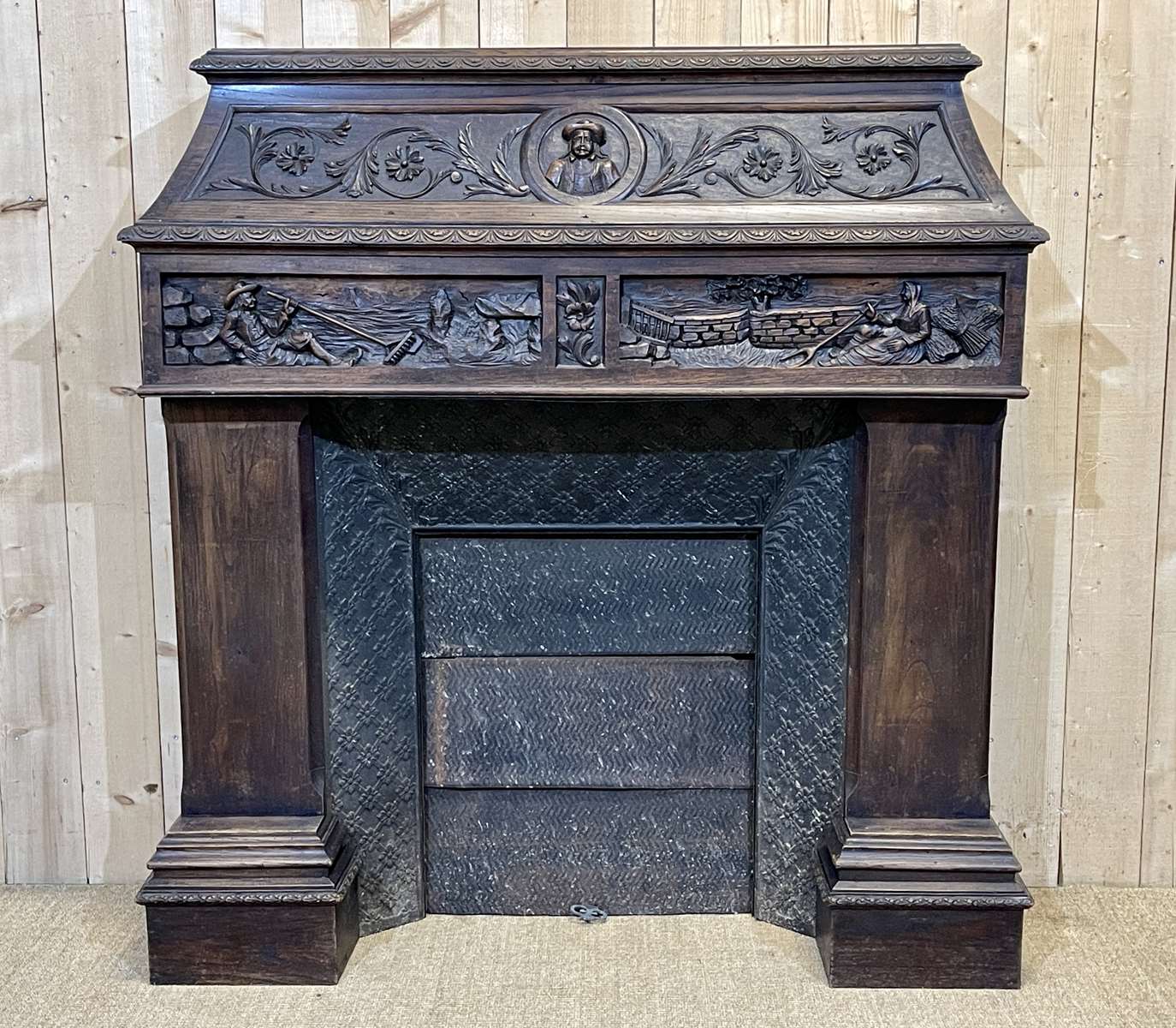Breton chestnut fireplace mantle of the early twentieth century