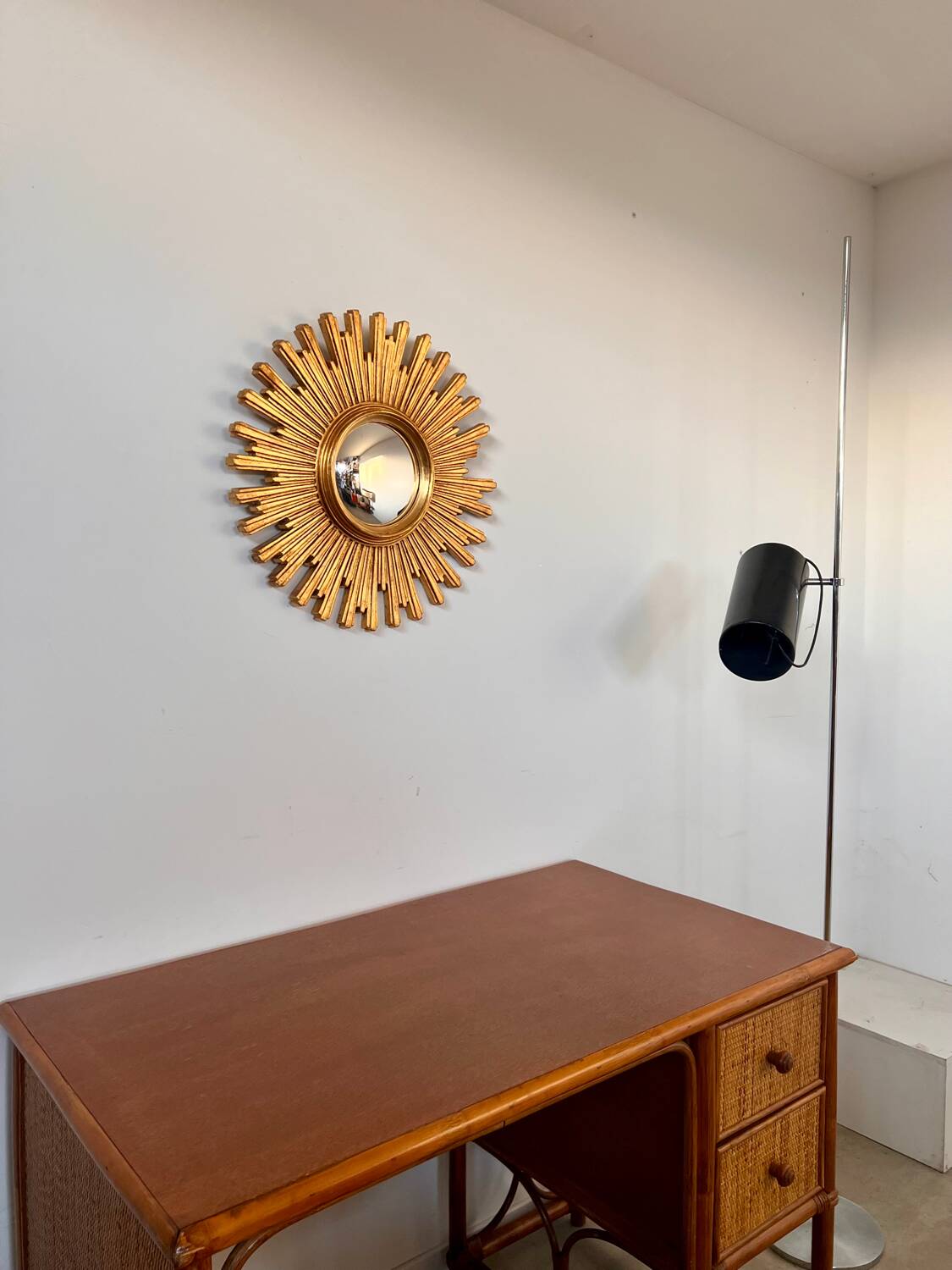 Old large golden sun mirror with rounded witch's eye in vintage resin from the 70s