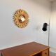Ancien miroir soleil doré œil de sorcière bombé en résine, années 70