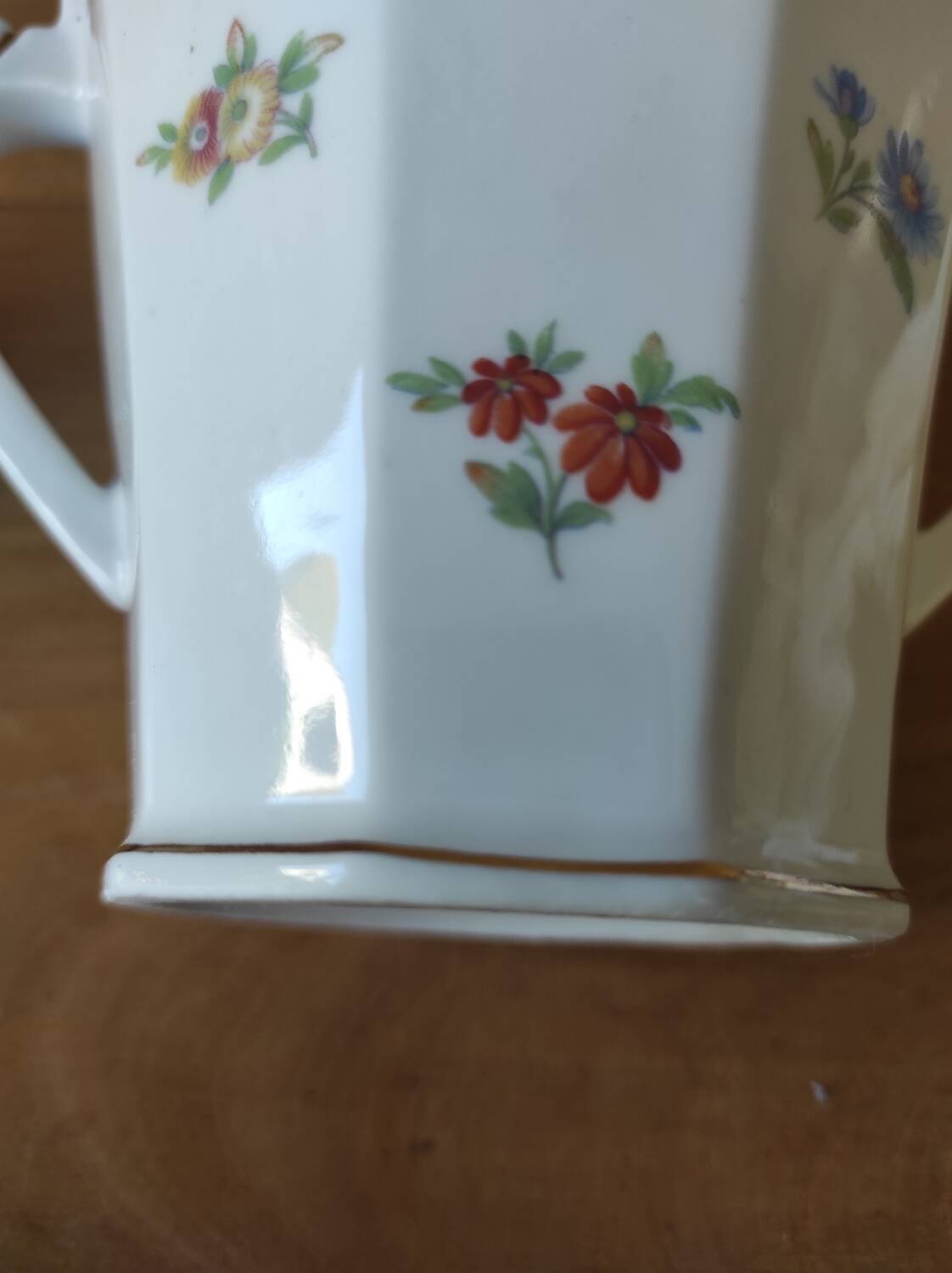 Porcelain sugar bowl with floral decoration