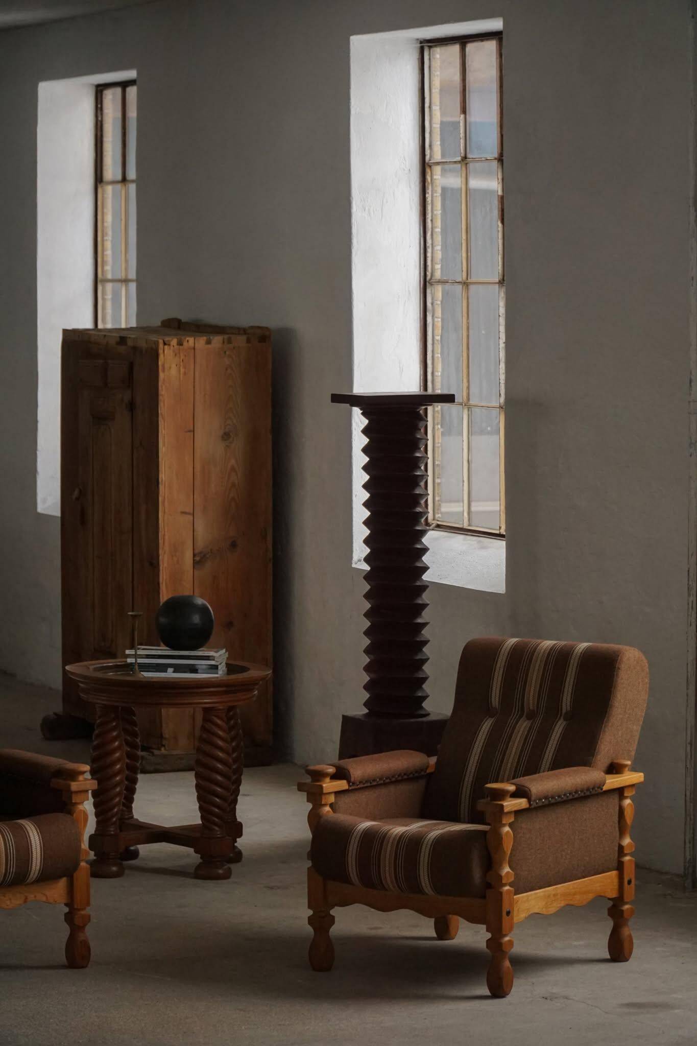Modern Danish mid-century table, made of oak with spiral turned legs and a glass top, 1950s.