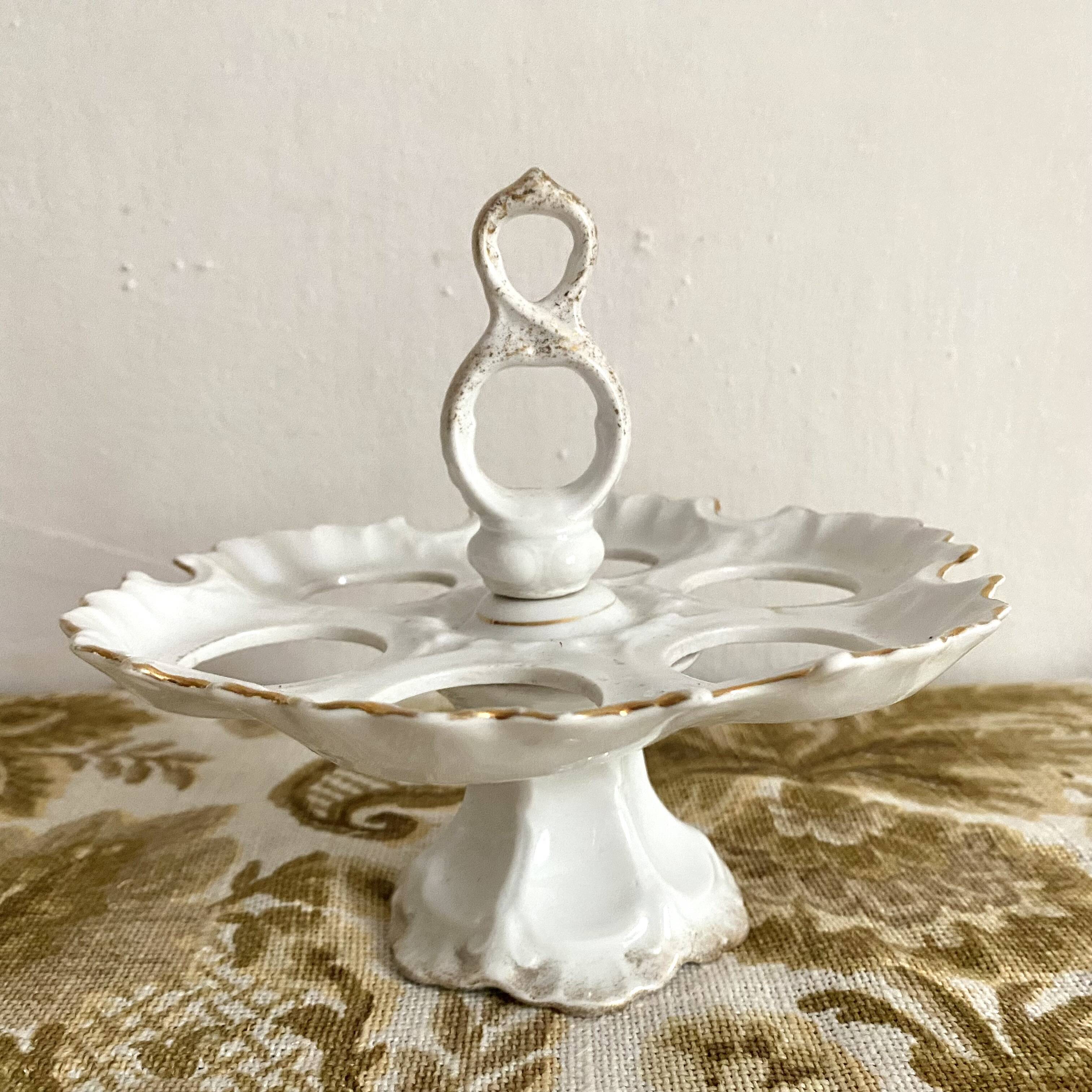 Early 20th century porcelain egg display