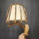 Pair of wall sconces in rattan