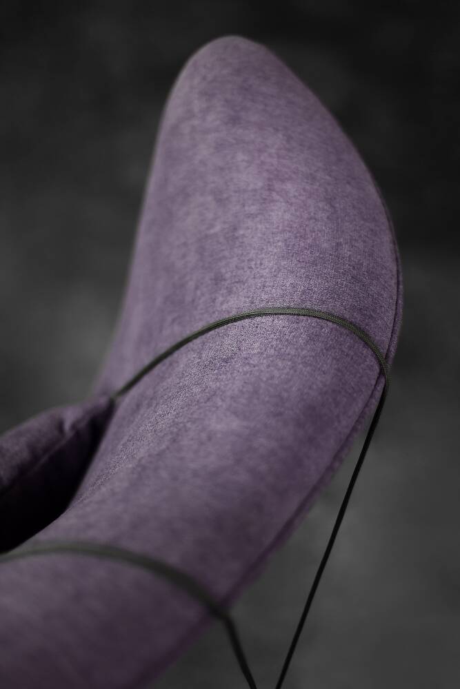 High-backed wing chair in oak and purple fabric, vintage Scandinavian style from the 1950s.