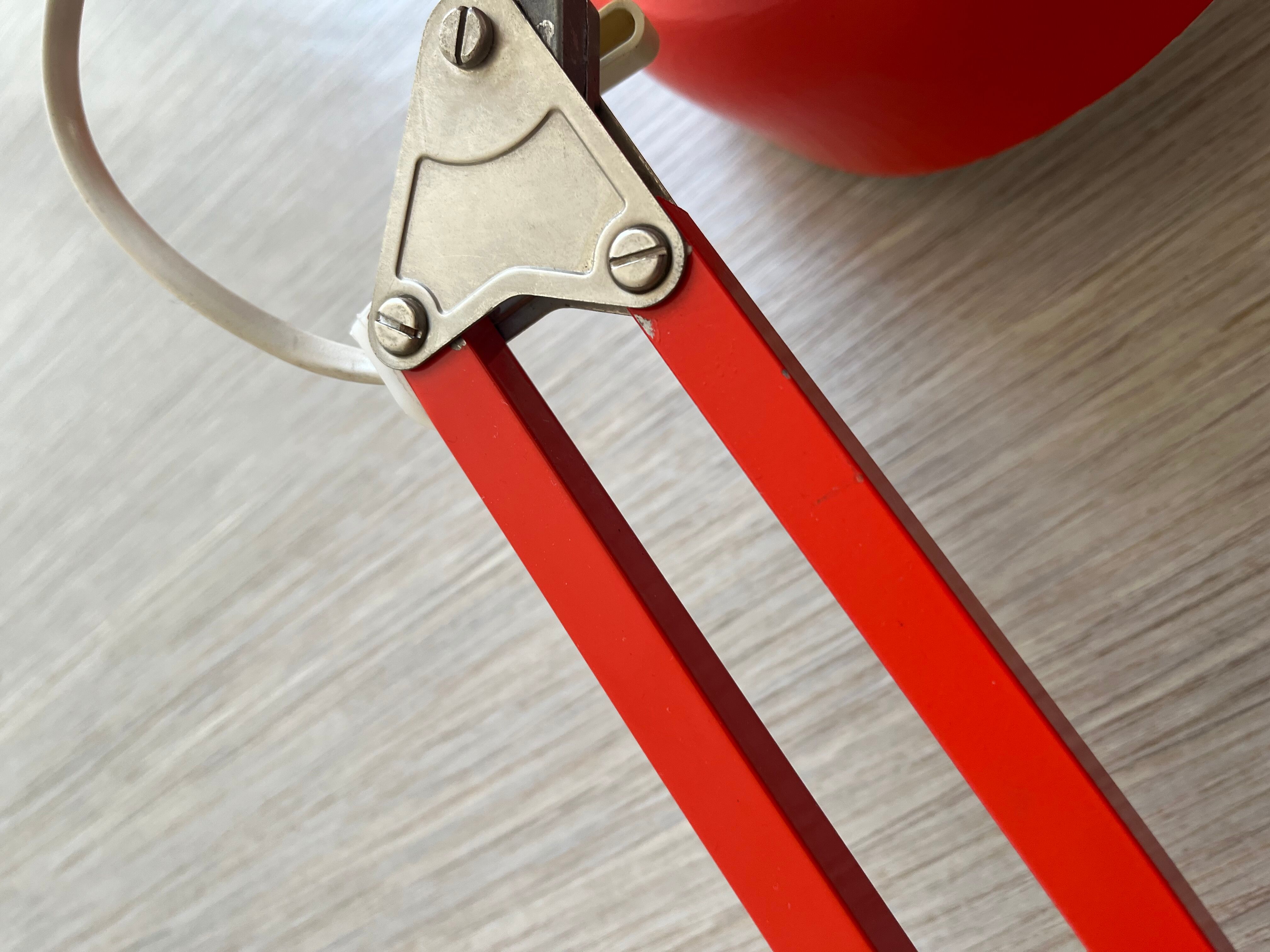 Vintage orange articulated desk lamp