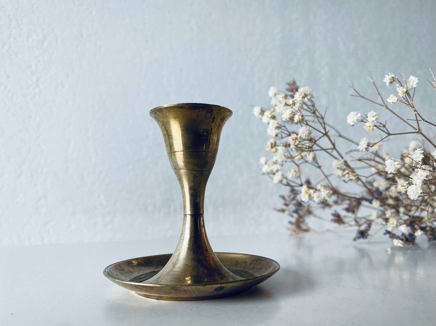 Golden brass candle holder