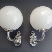 Pair of chrome wall sconces for bathroom with vintage fish pattern.