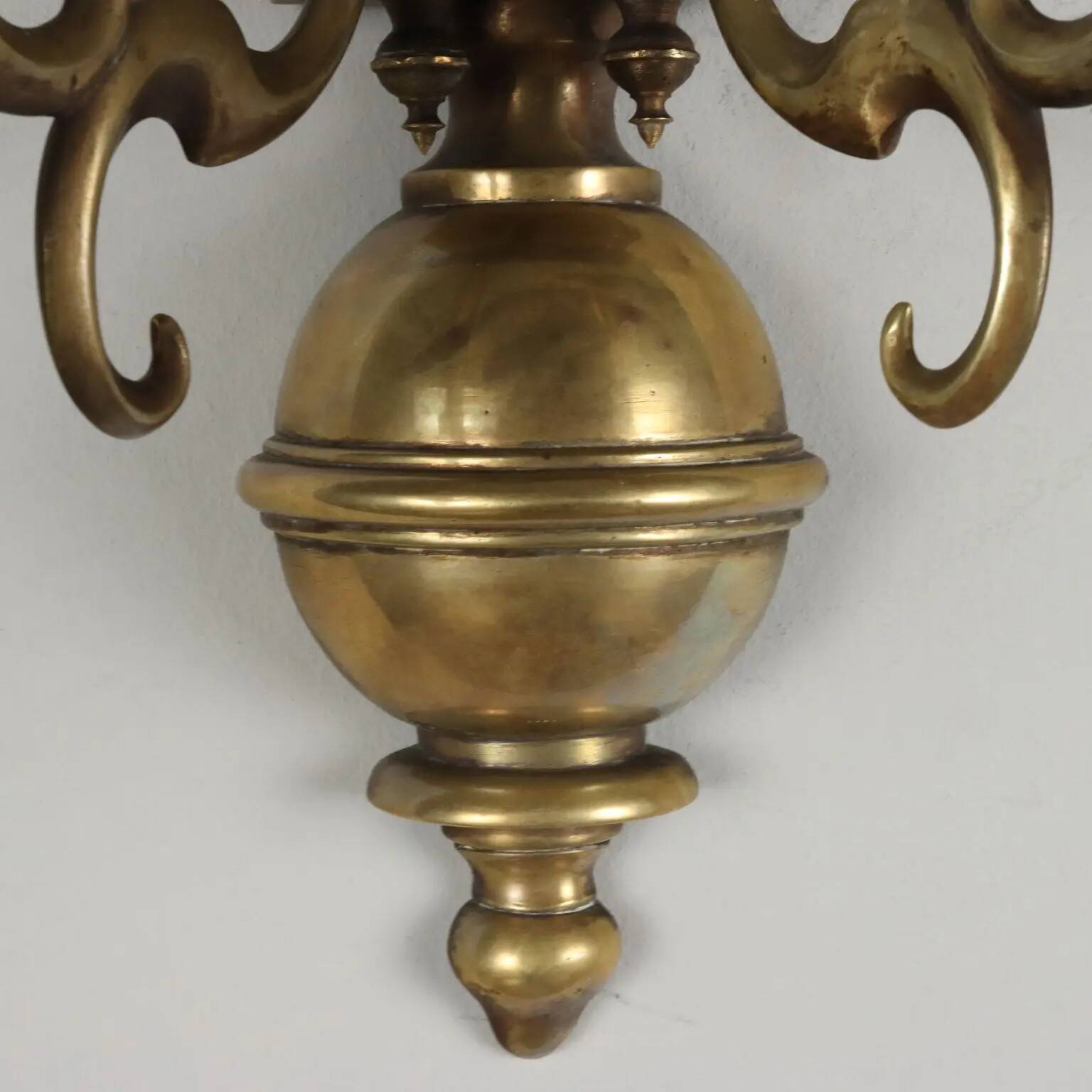Pair of antique wall sconces in 20th-century Baroque style.