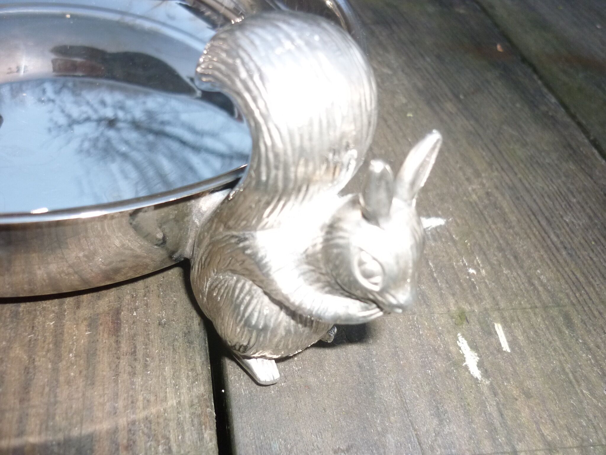 Silver metal dish with squirrels