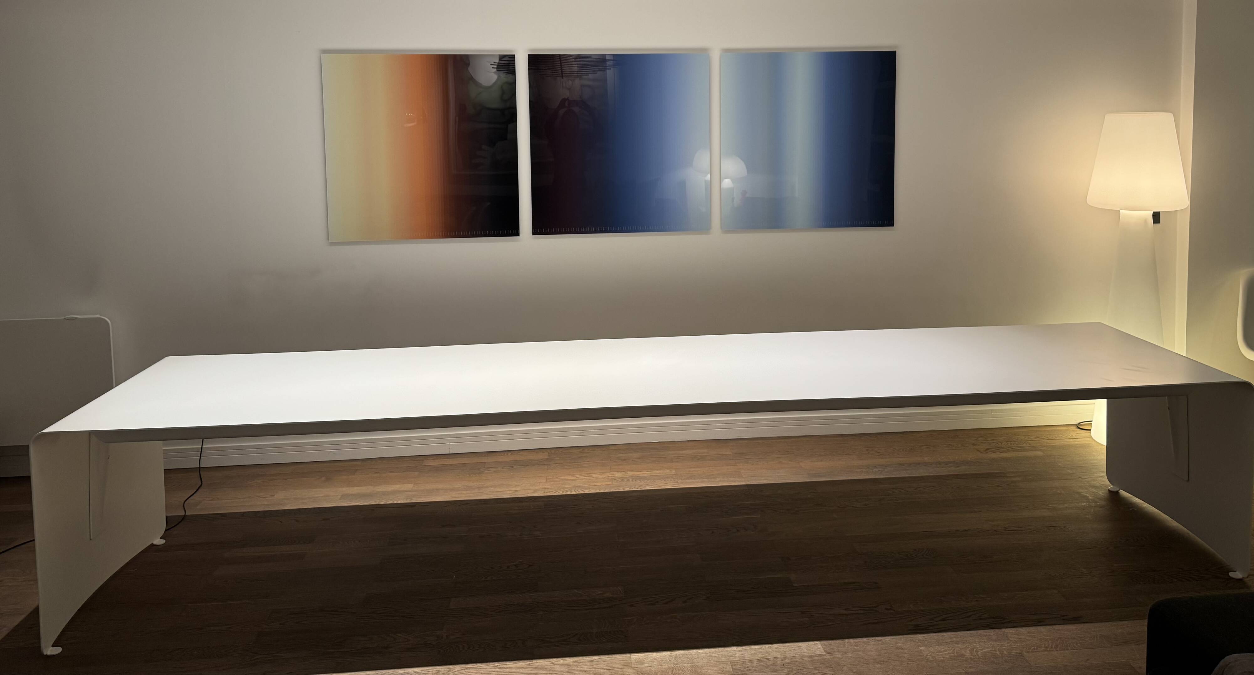 Large curved aluminium tabletop.