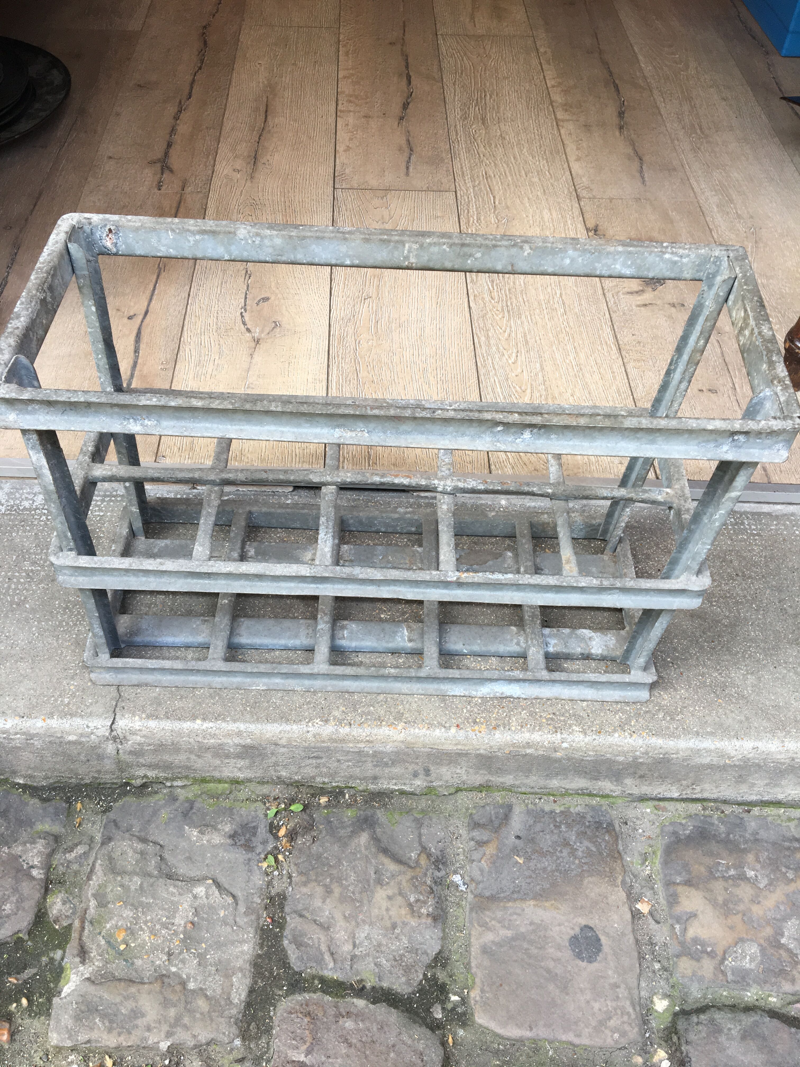 Old bottles in rectangular zinc locker