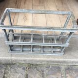 Old bottles in rectangular zinc locker