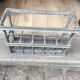 Old bottles in rectangular zinc locker