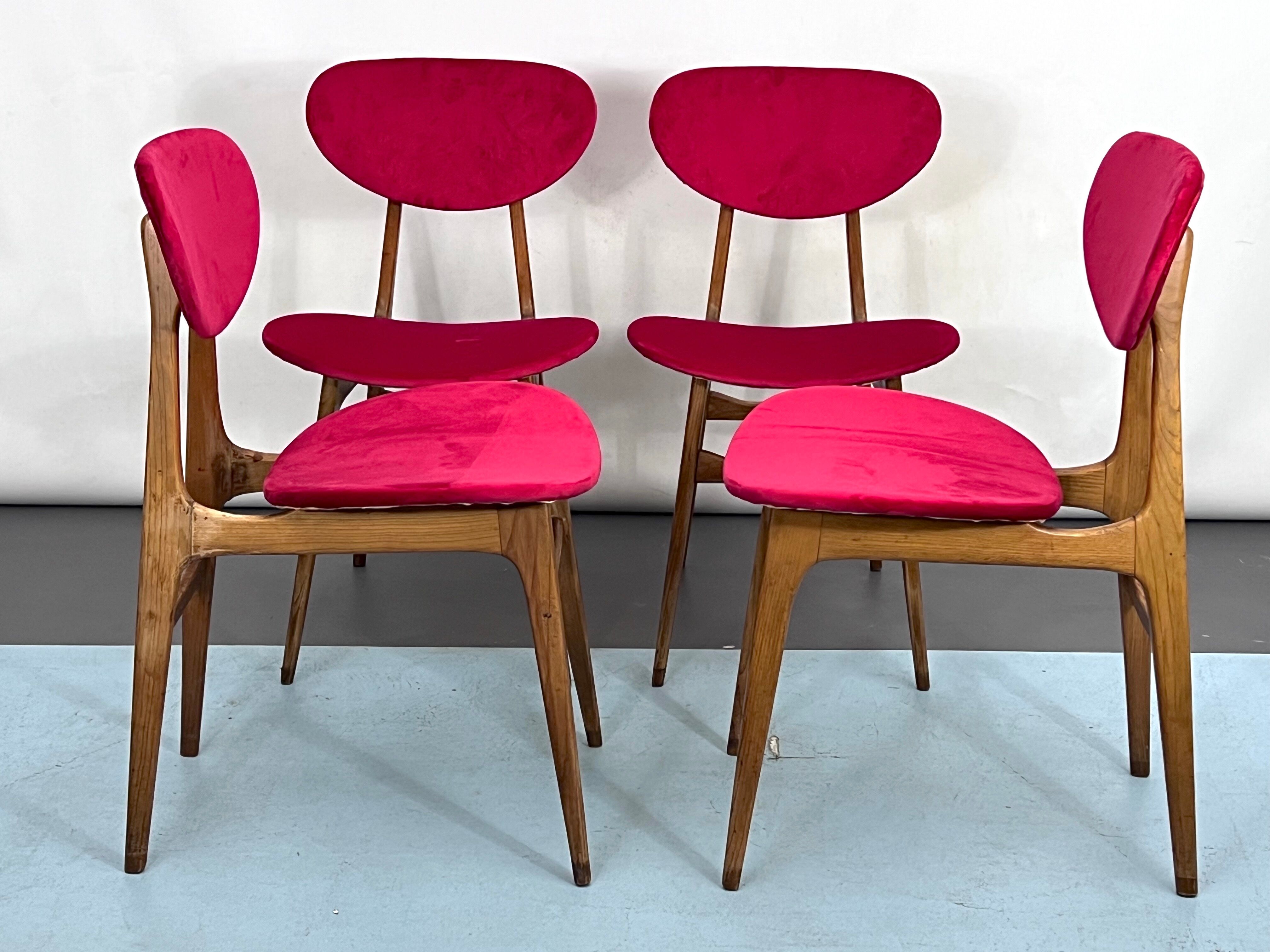 Set of four red velvet and wood dining chairs, Italy 1950