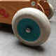 Walking trolley with multicolored wooden cubes