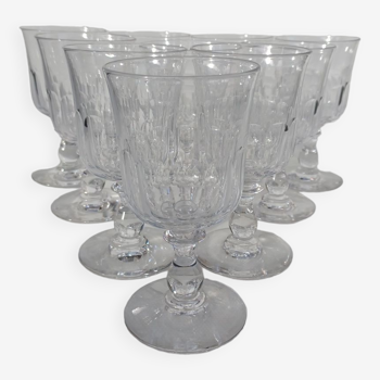 10 verres en cristal de Baccarat, modèle à côtes plates. Vers 1910.