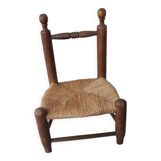 Children's wooden and straw chair
