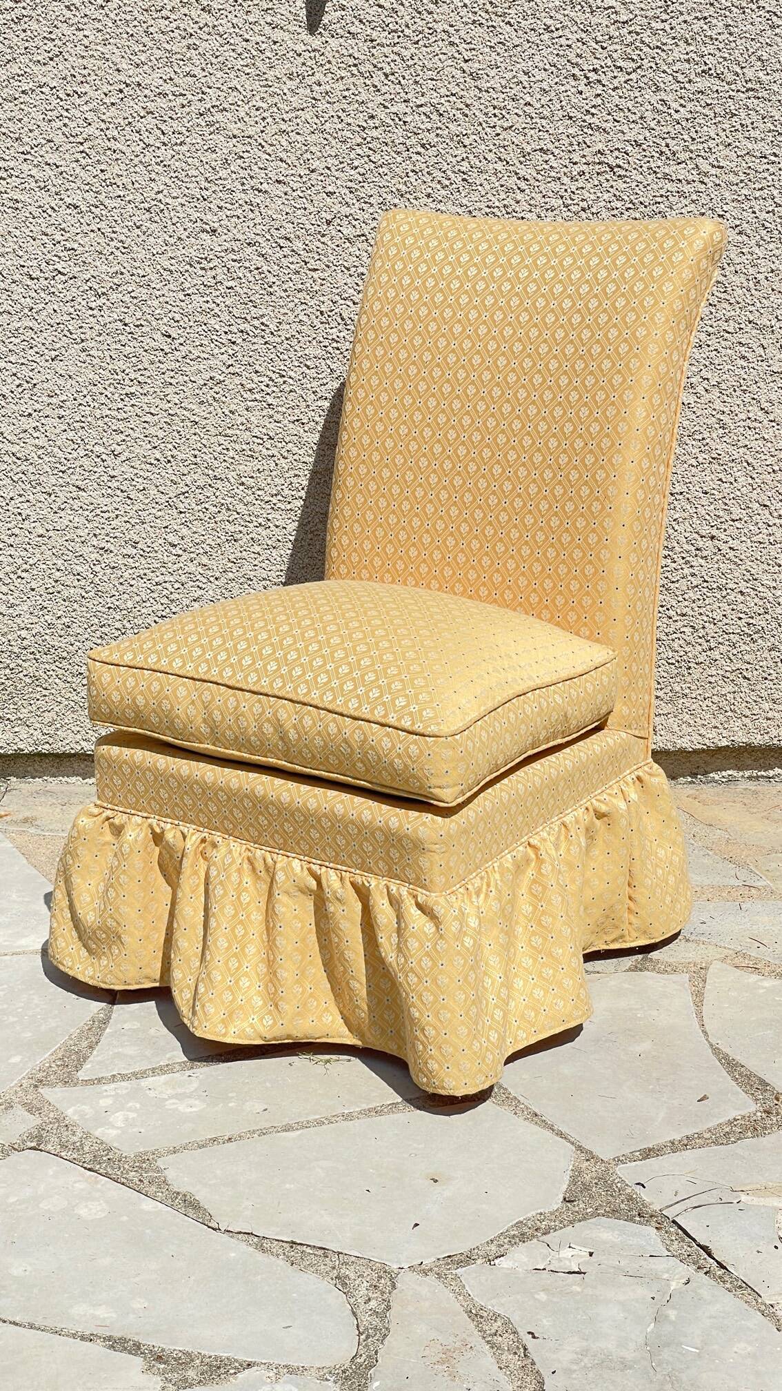 Vintage upholstered fabric toad armchair