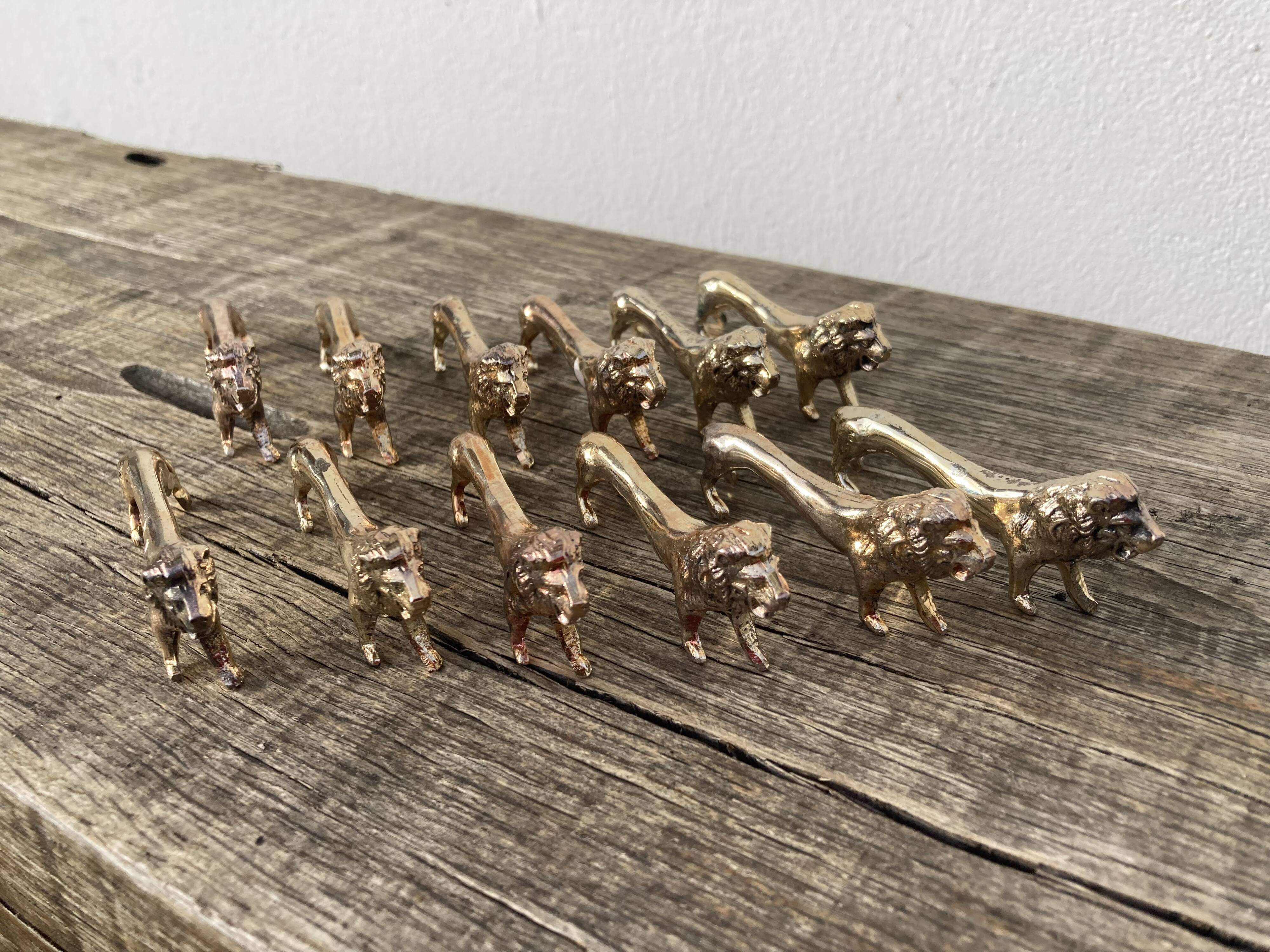 12 vintage gilded gold metal lion animal knife holders