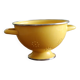 Old yellow enameled colander