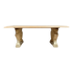 Table en pierre avec piètement à décor de protomes de lions ailés