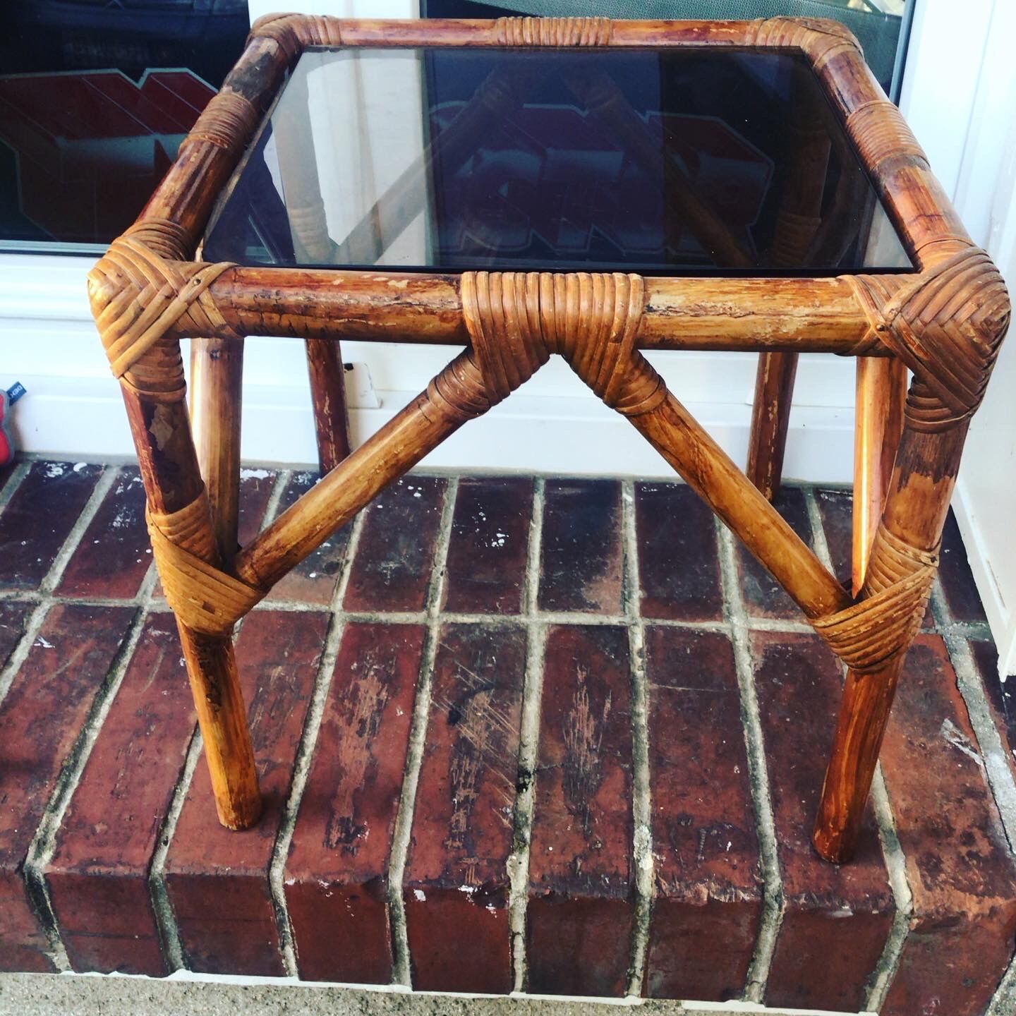 Low table in rattan and smoked glass