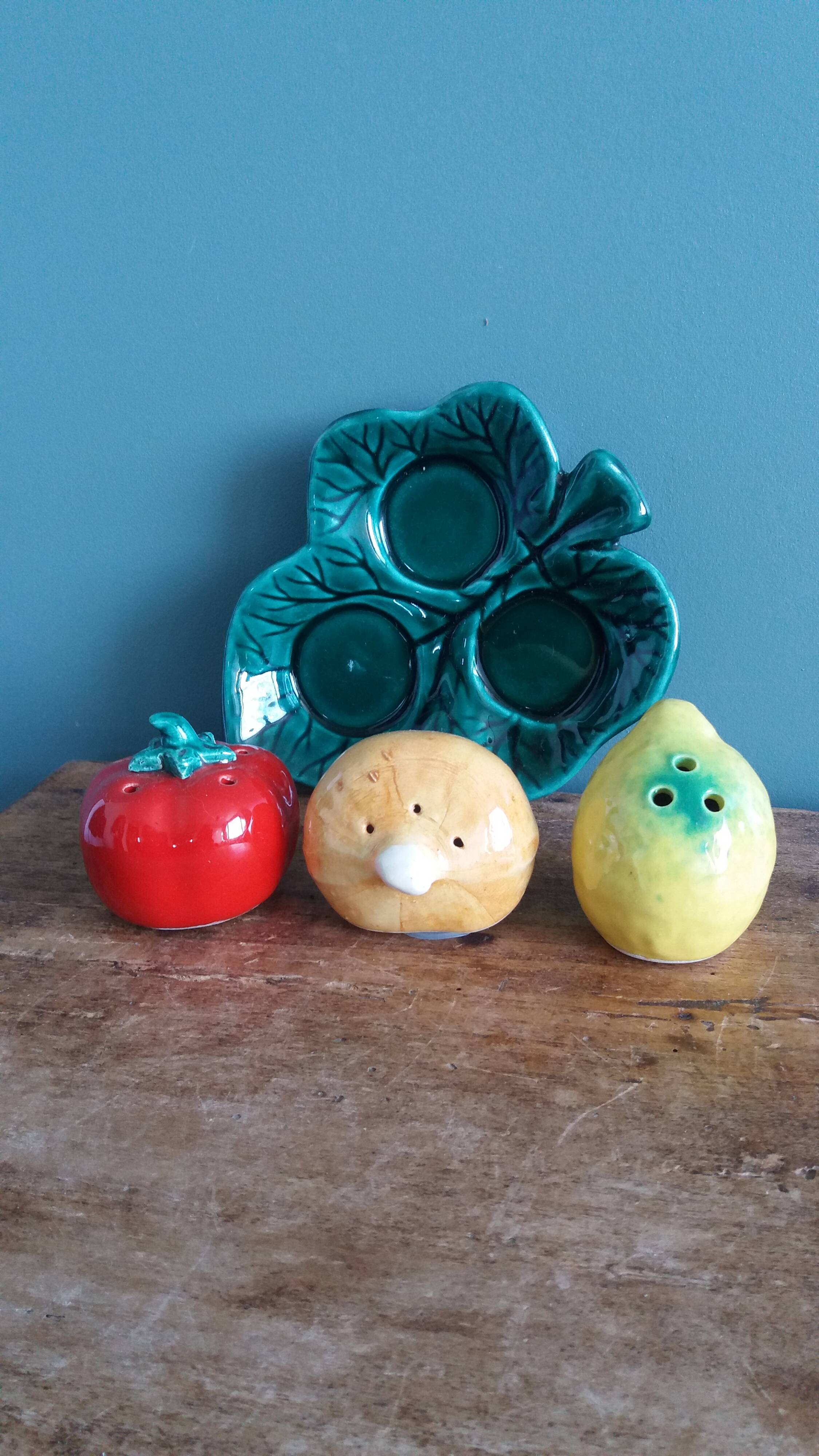 Salt and pepper shaker vegetables on a slipware leaf signed FPP Vallauris.