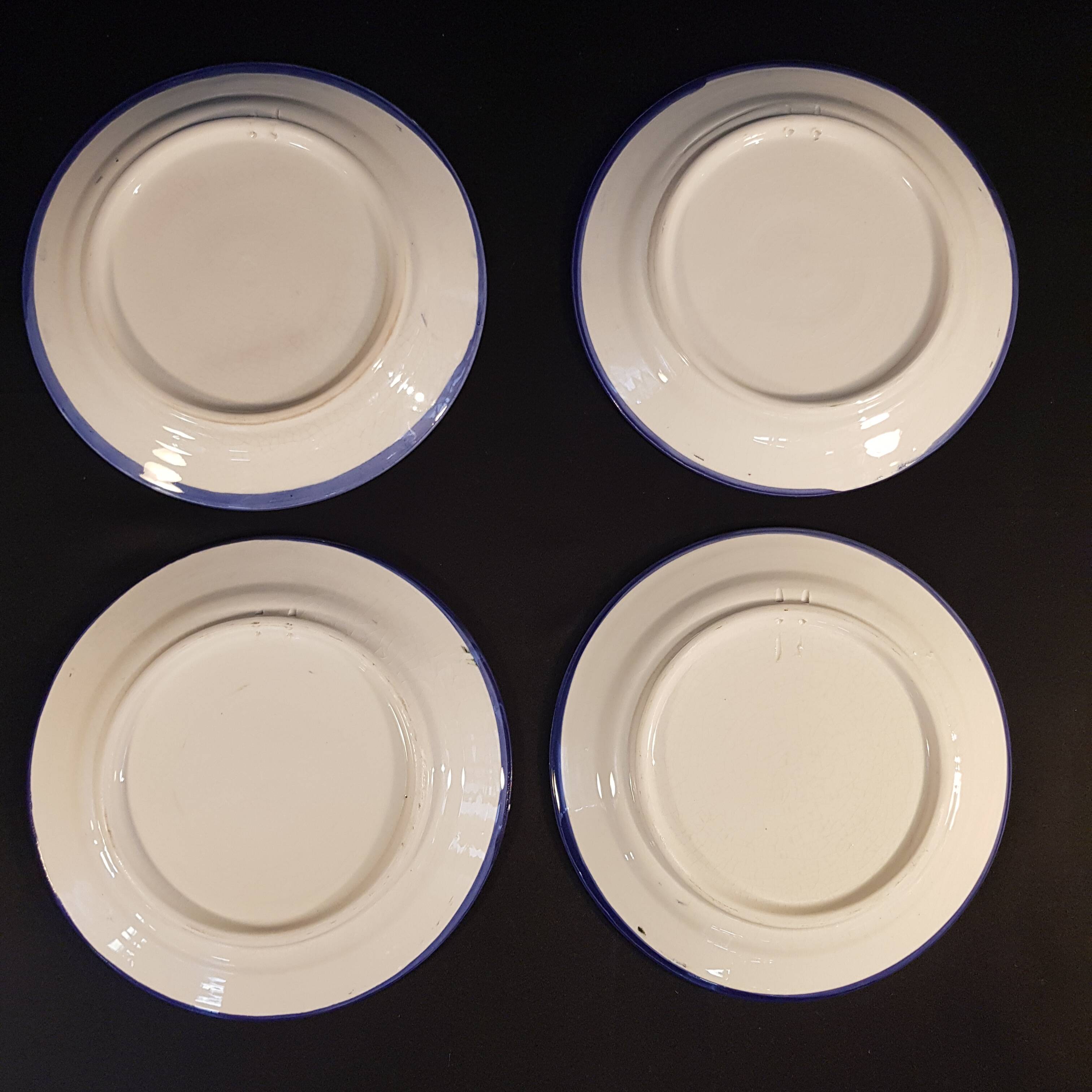 4 decorative earthenware plates