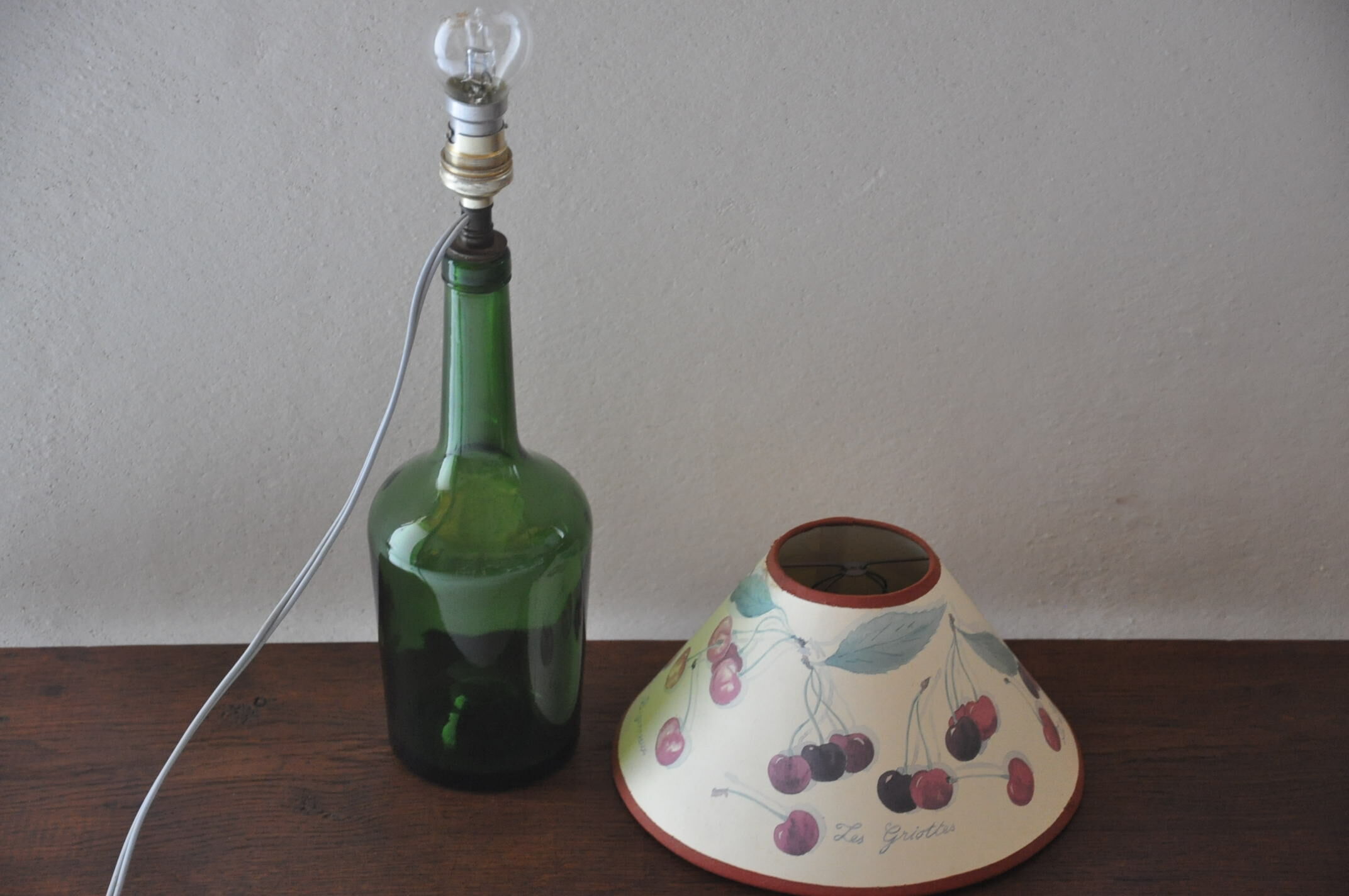 Lampe bouteille en verre vert