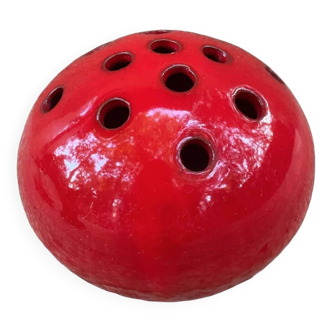 Red ceramic flower holder