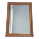 Miroir en bois stuc doré et verre biseauté
