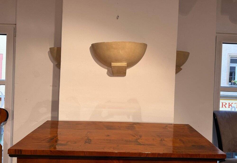 Art Deco wall lights in patinated plaster, France, 1925, set of 3