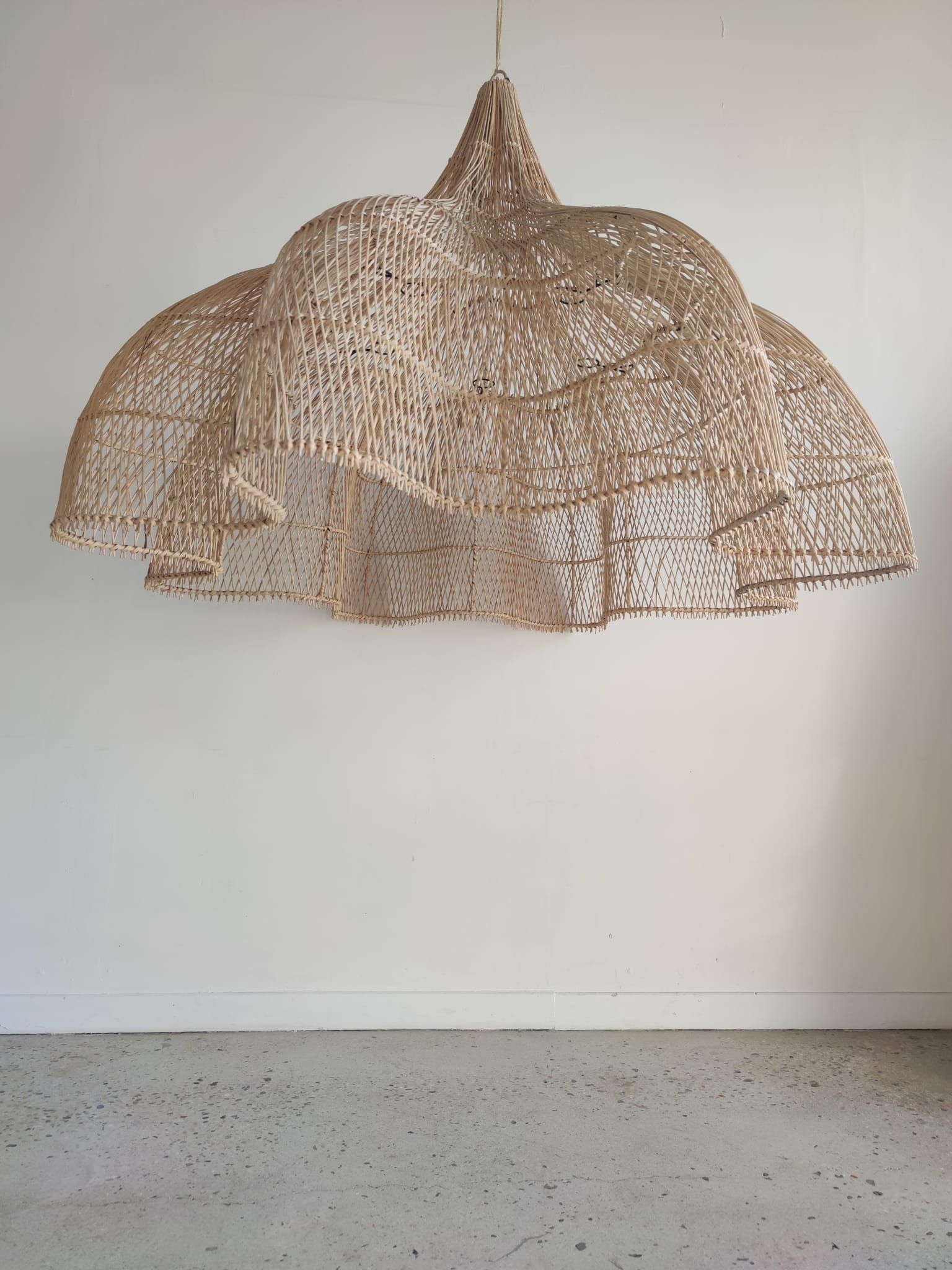 Huge rattan suspension in the shape of a corolla H:1m; D: 1m50