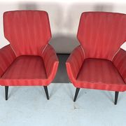 Mid-century modern pair of red armchairs. italy 1950s
