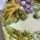 Lot of 4 Onnaing barbotine plates with grapevine design.