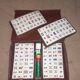 Complete vintage mahjong game with a faux leather case.