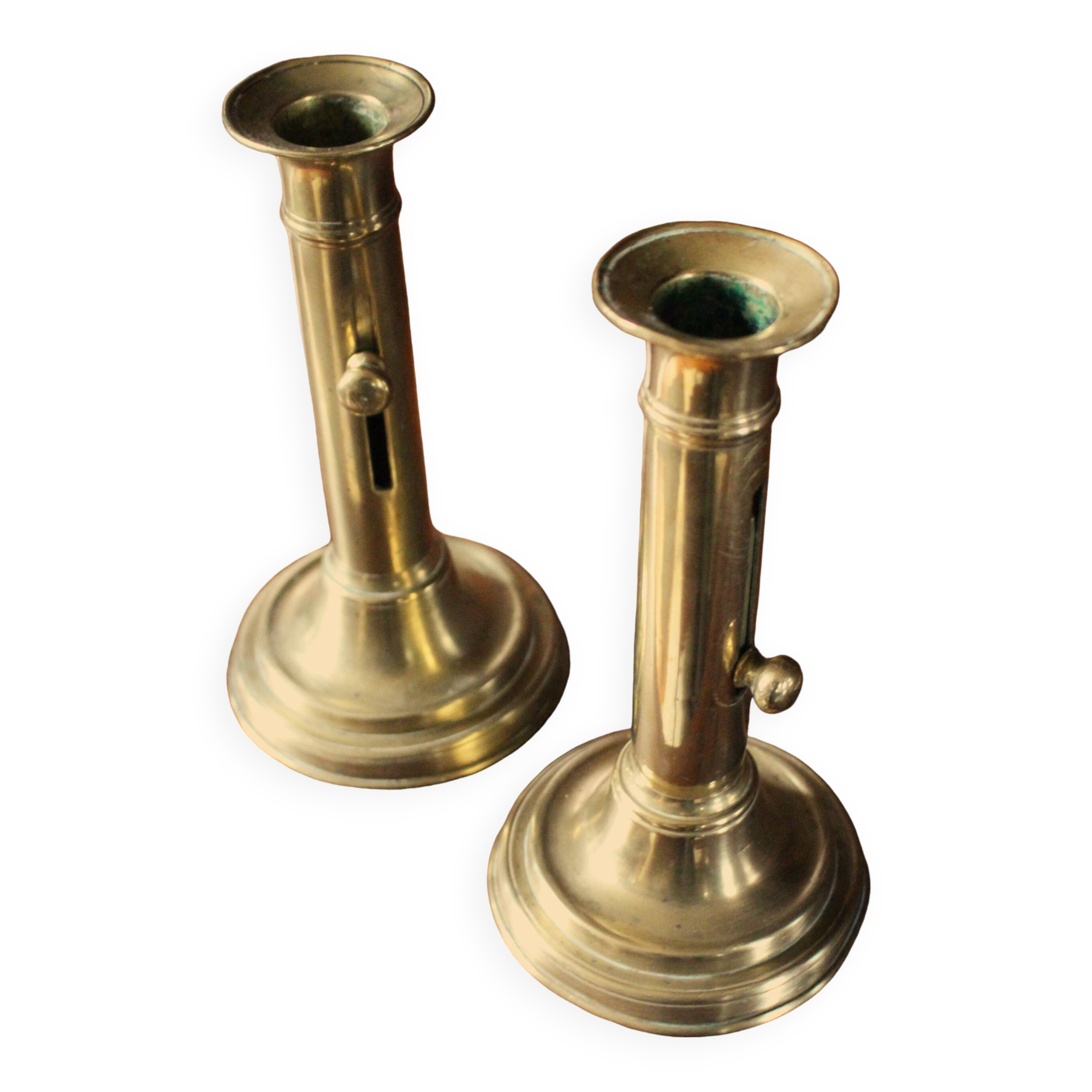 Pair of brass push-button candlesticks