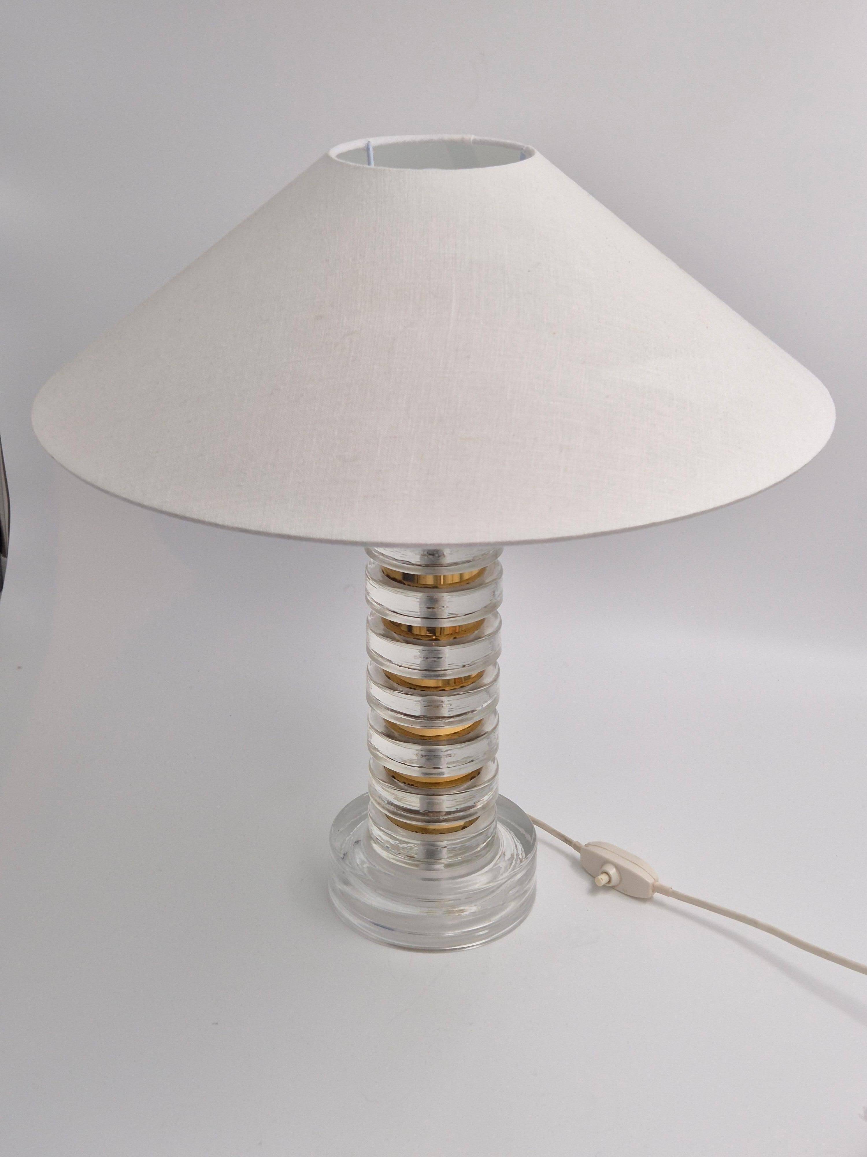 The Modern Scandinavian / Midcentury Modern table lamp with Orrefors glass and brass.