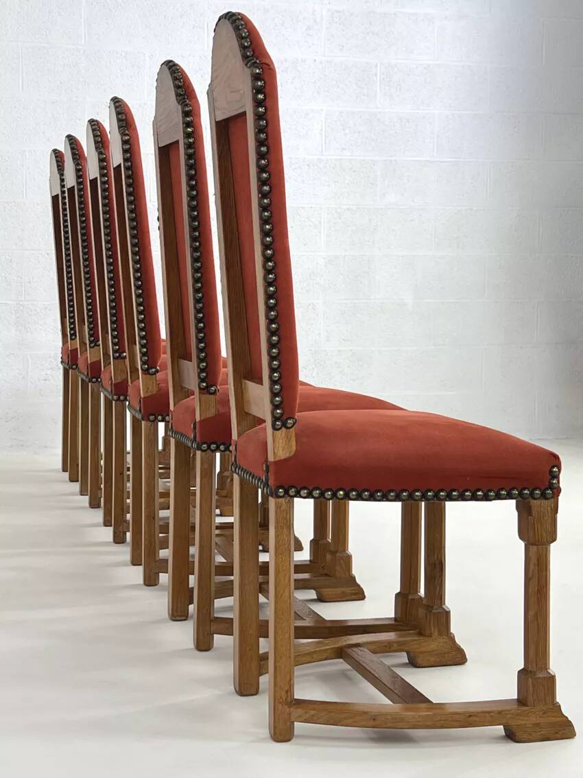 Set of 8 chairs in Louis XIII style made of oak and fabric.