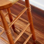 Tabouret de bar ancien en bois et assise paillée