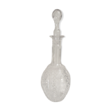 Old carafe in worked glass