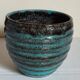 Ceramic planter with speckled enamel gadroons from the 1940s