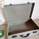 Old metal suitcase green leather handle