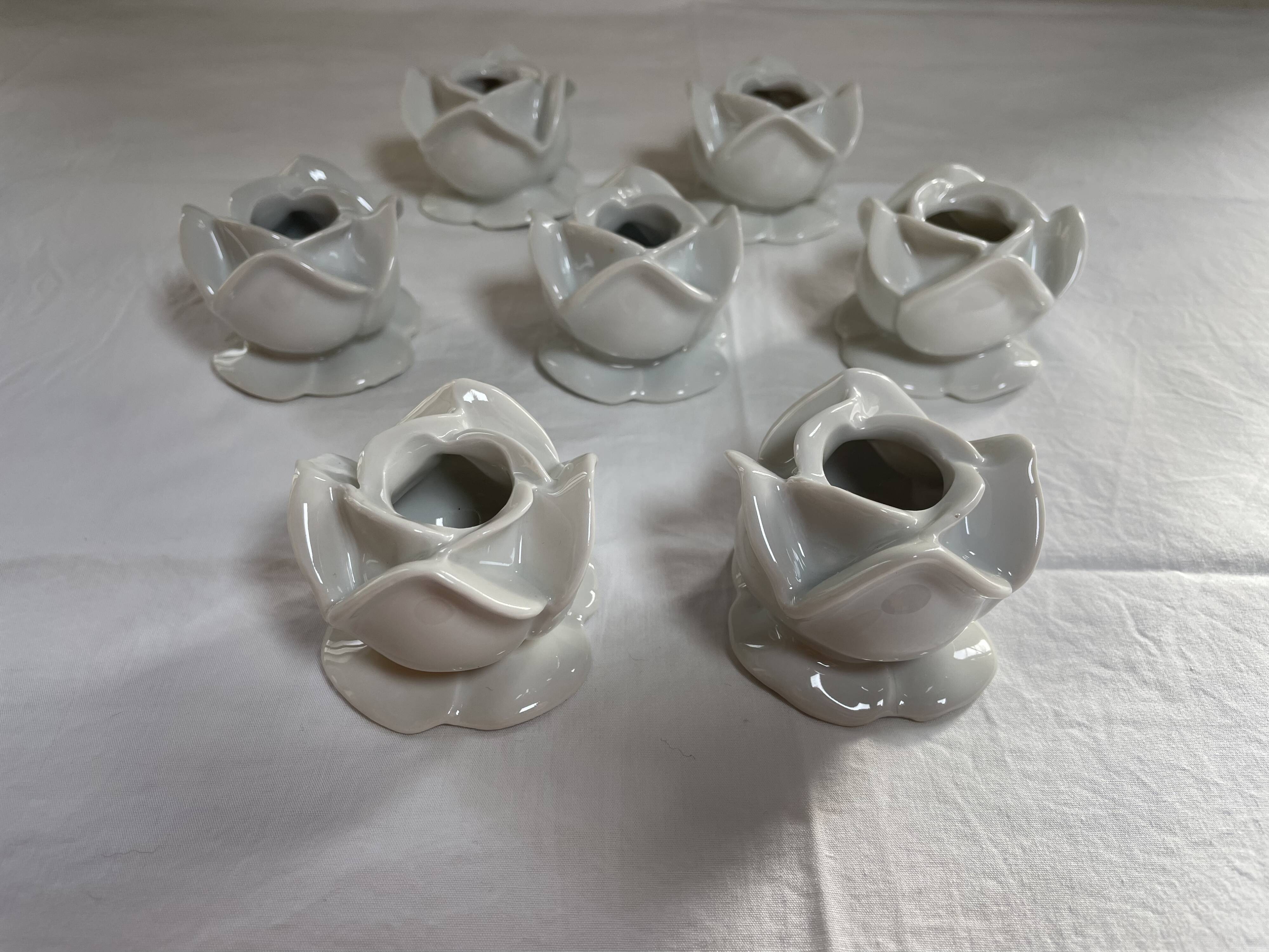 White porcelain rose shaped candle holders