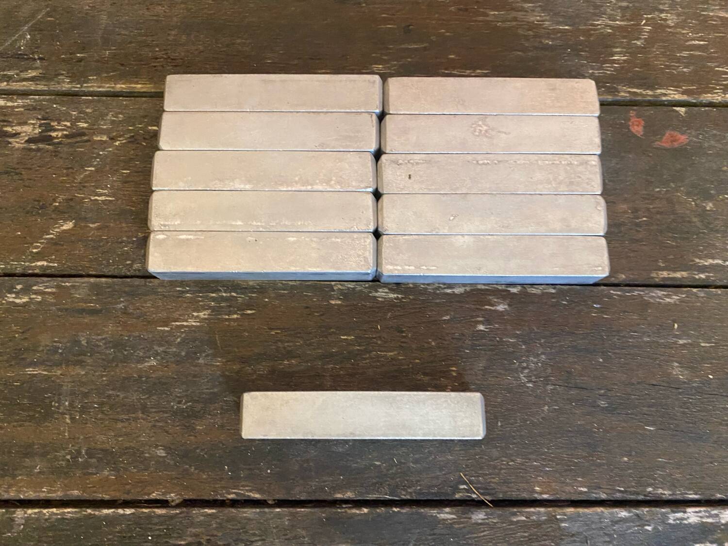Set of 11 vintage aluminium knife rests from the 1970s